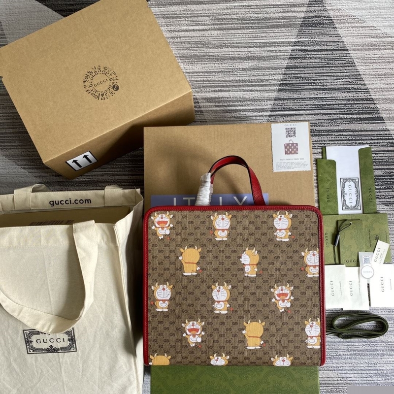 G*u*i shopping bags
